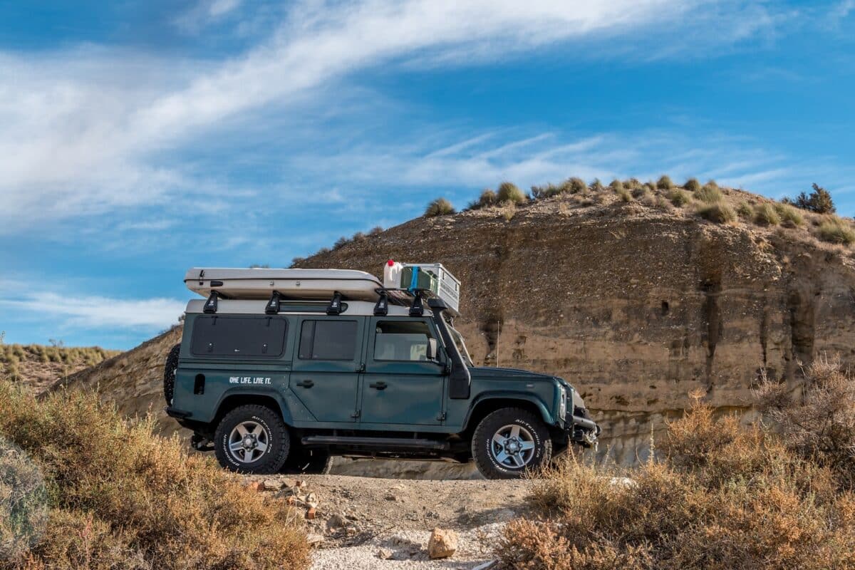 a car parked on a dirt road